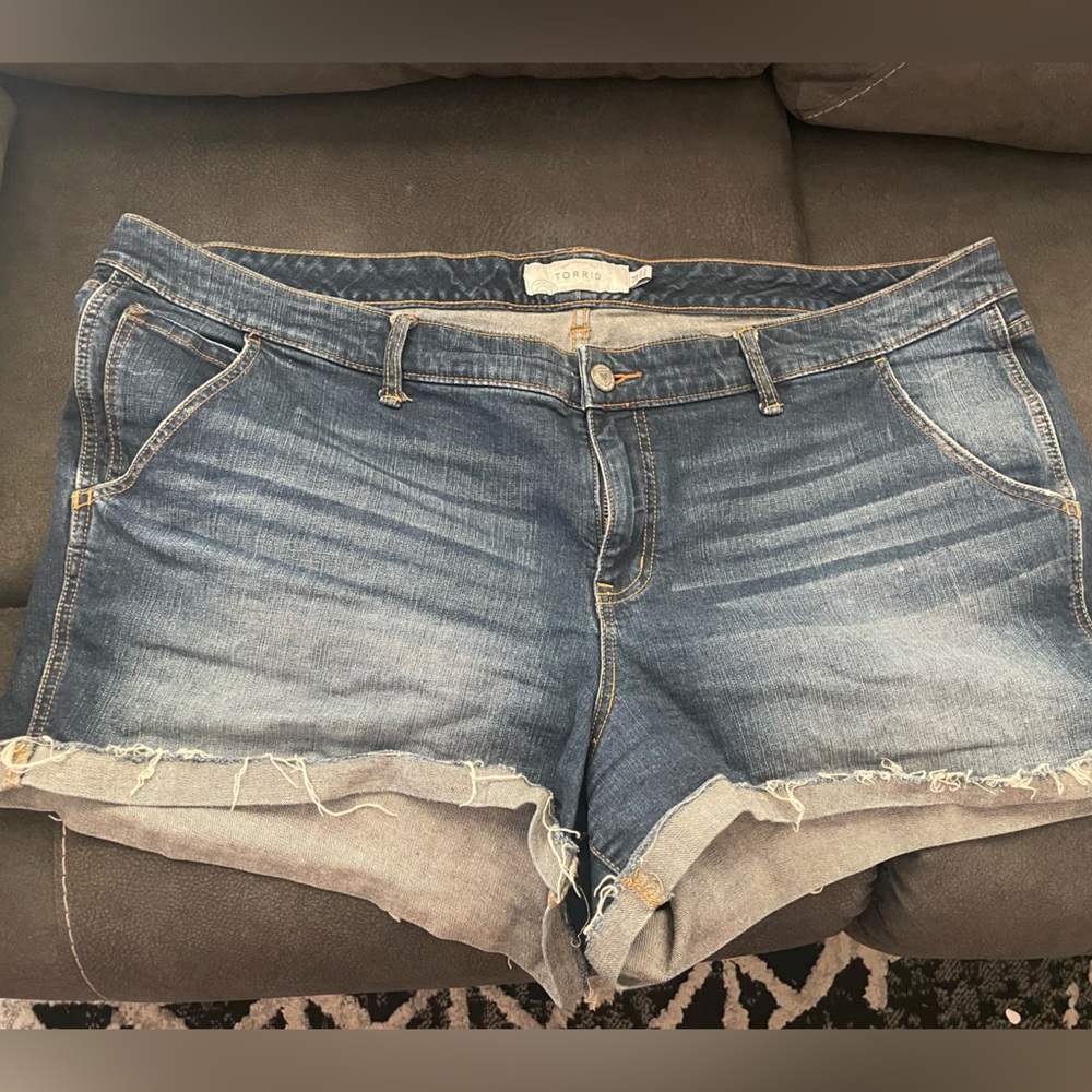 Torrid Mid Wash Denim Cut off Shorts